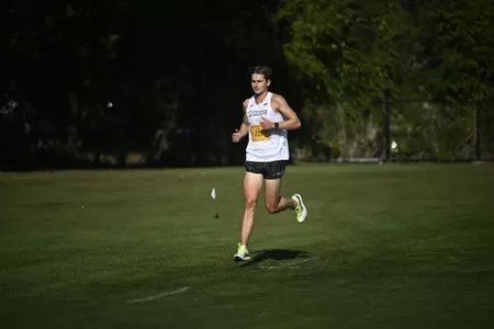 Cross country athlete Zane Powell running during the Lakefron Invitational for Providence.