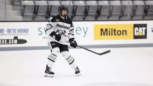 Women's ice hockey Bella Paolucci waiting for the puck during a game