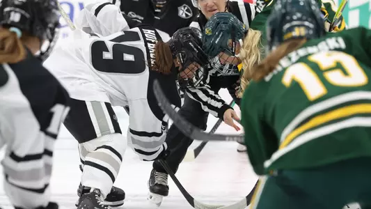 Women's ice hockey player Emma Hofbauer getting ready to take a faceoff
