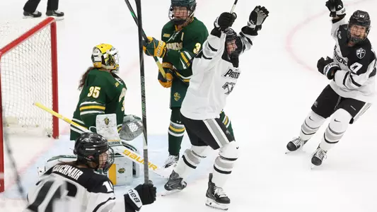 Women's ice hockey player Sarah Davies celebrating a goal