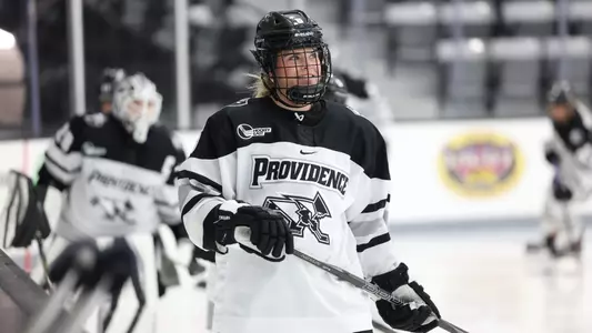 Women's ice hockey player Hannah Clarke skating during warmups