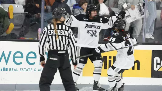 Women's ice hockey player Reichen Kirchmair celebrating a goal