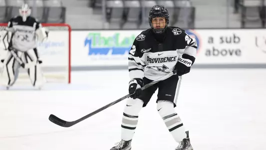 Women's ice hockey player Brenna O'Reilly defending during a game