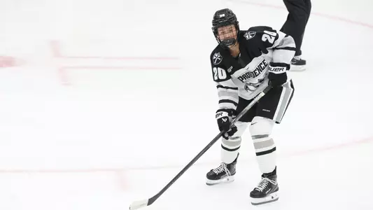 Women's ice hockey player Molly Farace waiting for the puck during a game