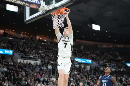 Stefan Vaaks dunks versus Rhode Island at the Amica Mutual Pavilion. 