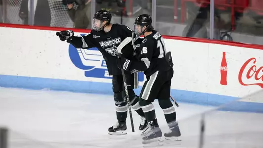 MIH - Will Elger and Trevor Connelly celebrate at Northeastern