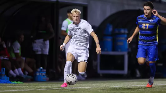 Ian Abbey dribbles the ball vs New Haven