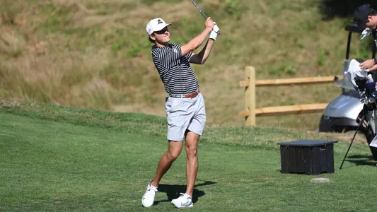 Men's golf player Will Spring hitting a tee shot