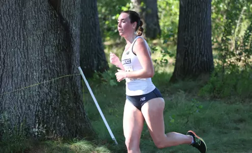 Emily Bush running at the Friar invitational on September 5th, 2025