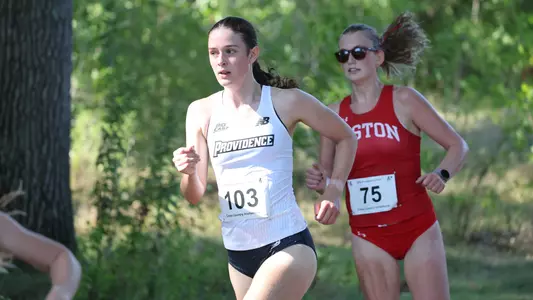 Ciara Evans running at the Friar invitational Cross Country meet on September 5th, 2025