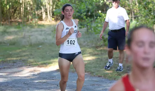Emily Disarno running at the Friar invitational Cross Country meet on September 5th, 2025