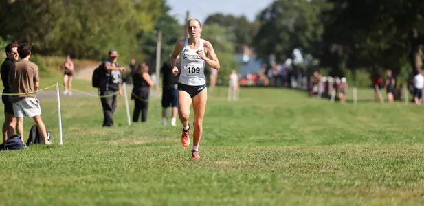 Gabby Schmidt running at the Friar invitational Cross Country meet on September 5th, 2025