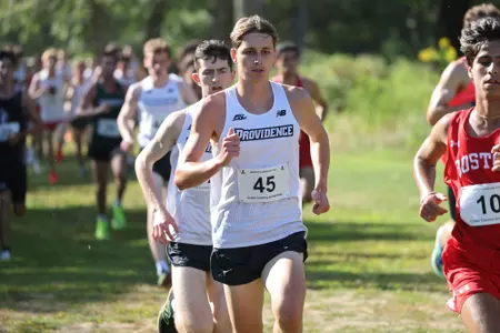Zane Powell running during a 2025 cross country meet