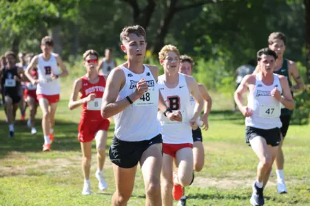 Grady Satterfield running during a 2025 cross country meet.