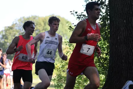 Liam McCay running during a 2025 cross country meet.