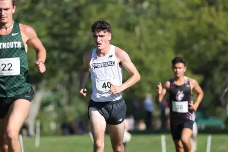 Cormac Dixon running for the Friars during a 2025 cross country meet.
