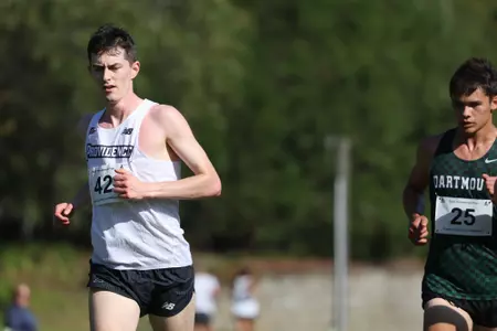 Will Johnston running during a 2025 cross country meet