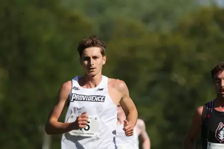 Zane Powell running during a 2025 cross country meet.