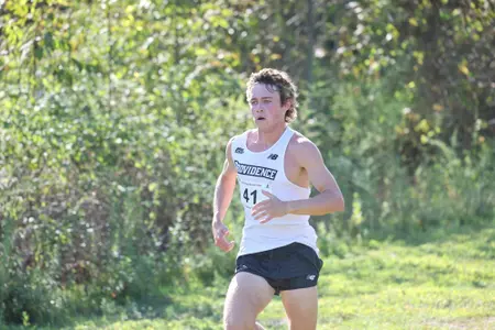 Jack Dowd running during a 2025 cross country meet.