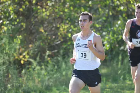 Nick Cassarino running during a 2025 cross country meet