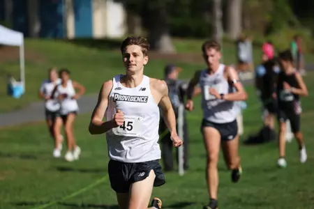 Zane Powell running during a 2025 cross country meet