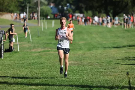 Ryan Welch running during a 2025 cross country meet