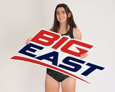Emily DiSarno holding a Big East sign