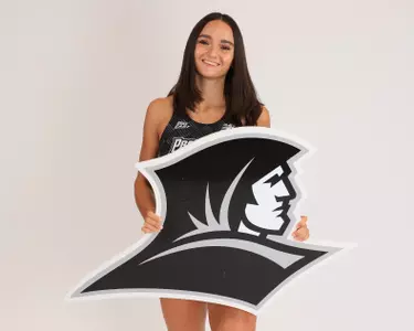 Elena Cabral holding a Friars sign