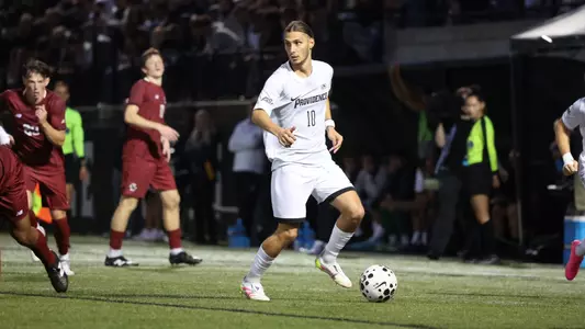 Diego Batista dribbles the ball down field vs BC in Providence, RI
