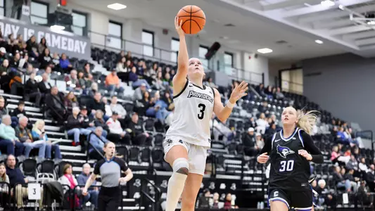 Orlagh Gormley taking a layup at Alumni Hall during a Big East game against Creighton