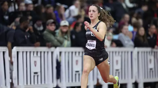 Women's track runner Cate Parks finishes 300