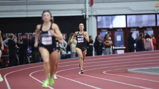 Women's track runner Britton Miller mid race