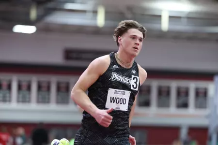 Eli Wood at the Harvard Beantown Challenge running 