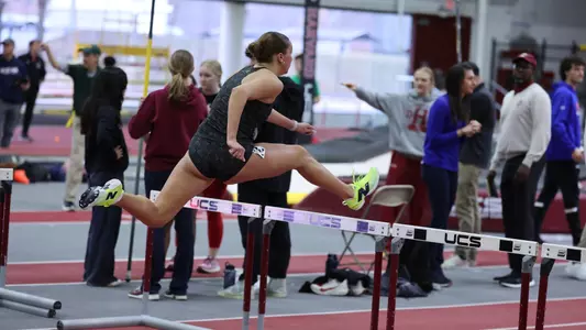 Morgan Blout hurdling at Harvard Beantown Challenge