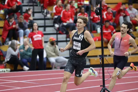 Zane Powell running on the track at the Harvard Beantown Challenge