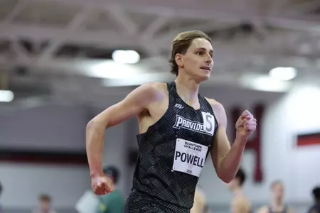 Zane Powell running on the track at the Harvard Beantown Challenge