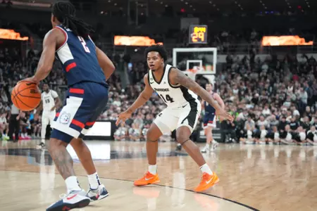 Corey Floyd defends the ball versus UConn at the Amica Mutual Pavilion. 