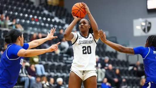 Teneisia Brown shooting a jumpshot at Alumni Hall in Providence, R.I. during a BIG EAST match against Seton Hall