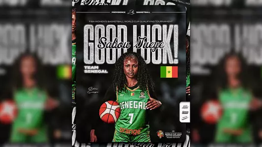 A graphic featuring Sabou Gueye of the Providence College women's basketball team wearing a uniform for her native-Senegal to announce the will play in the FIBA World Cup Qualifying Tournament in San Juan, Puerto Rico on March 11 through March 17.