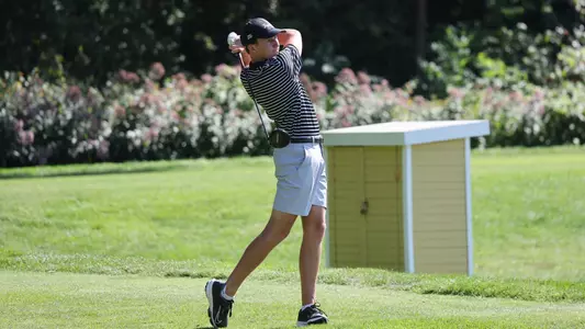 Men's golfer Logan Jaeger hitting a tee shot