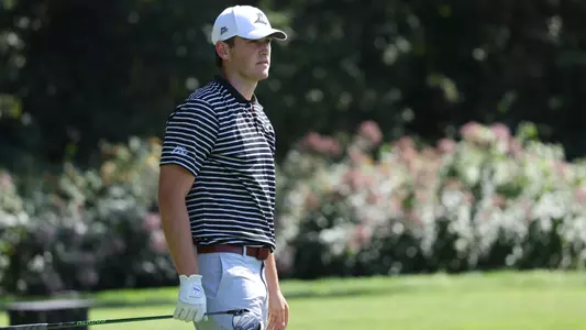 Men's golfer Kevin Legnard looking at his ball after a tee shot
