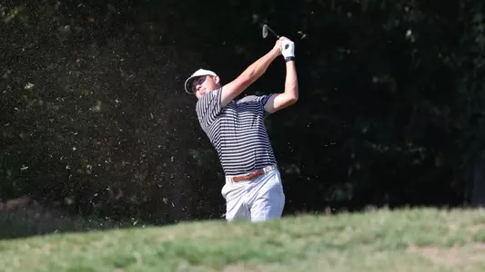 Men's golfer Campbell Skelly hitting a tee shot
