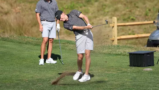 Men's golfer Liam O'Grady hitting a tee shot