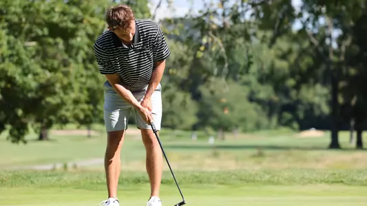Men's golf player Joe Halferty hitting a putt