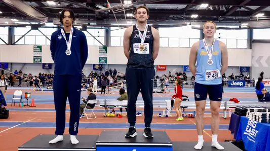 Jon Mignacca on podium at Big East Championships 