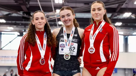 Maeve O'Neill on podium at Big East Championships 