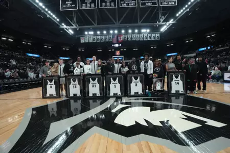 Jack Williams, Cole Hargrove, Duncan Powell, Jason Edwards, Jaylin Sellers and Corey Floyd Jr. pose with their families. 