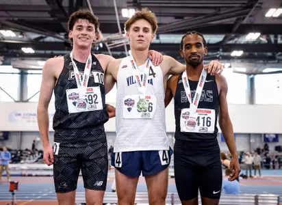Elliott Pugh on the podium with silver medal at 2026 Big East Indoor Track Championships