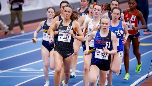 Gemma Galvin running the relay at 2026 Big East Indoor Track Championships