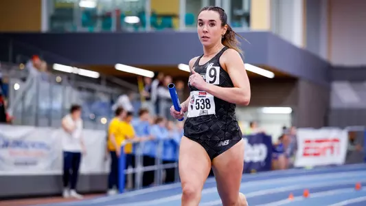 Emily Bush running the relay at 2026 Big East Indoor Track Championships